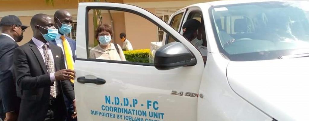The Iceland ambassador H.E Thordis Sigur Dardottir handing over vehicles to district chairperson, Ronald Sanya donated by the Iceland government Vehicles from Iceland government